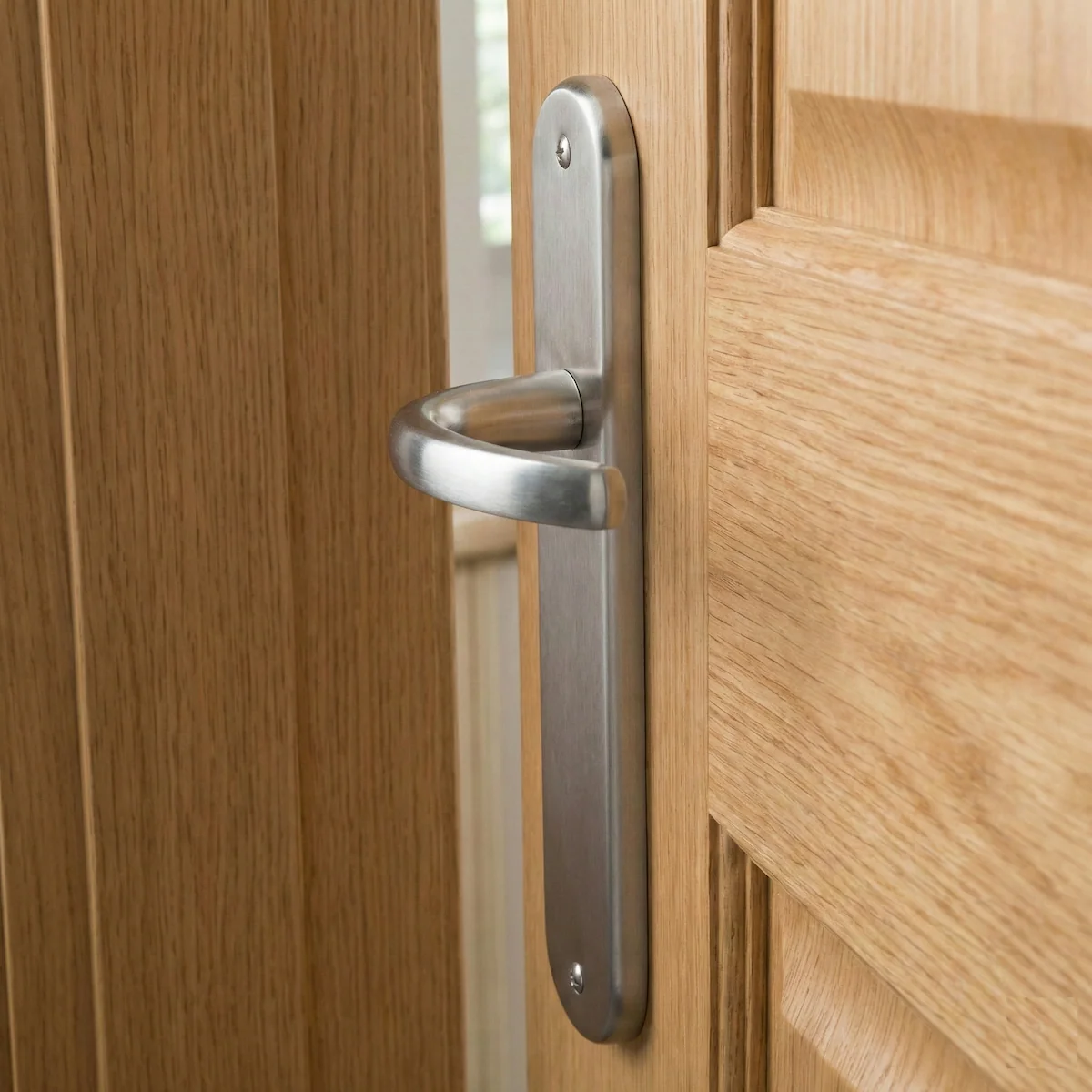 Manilla modelo '110' de zamak con placa oval en acabado níquel satinado para puertas - Image 4