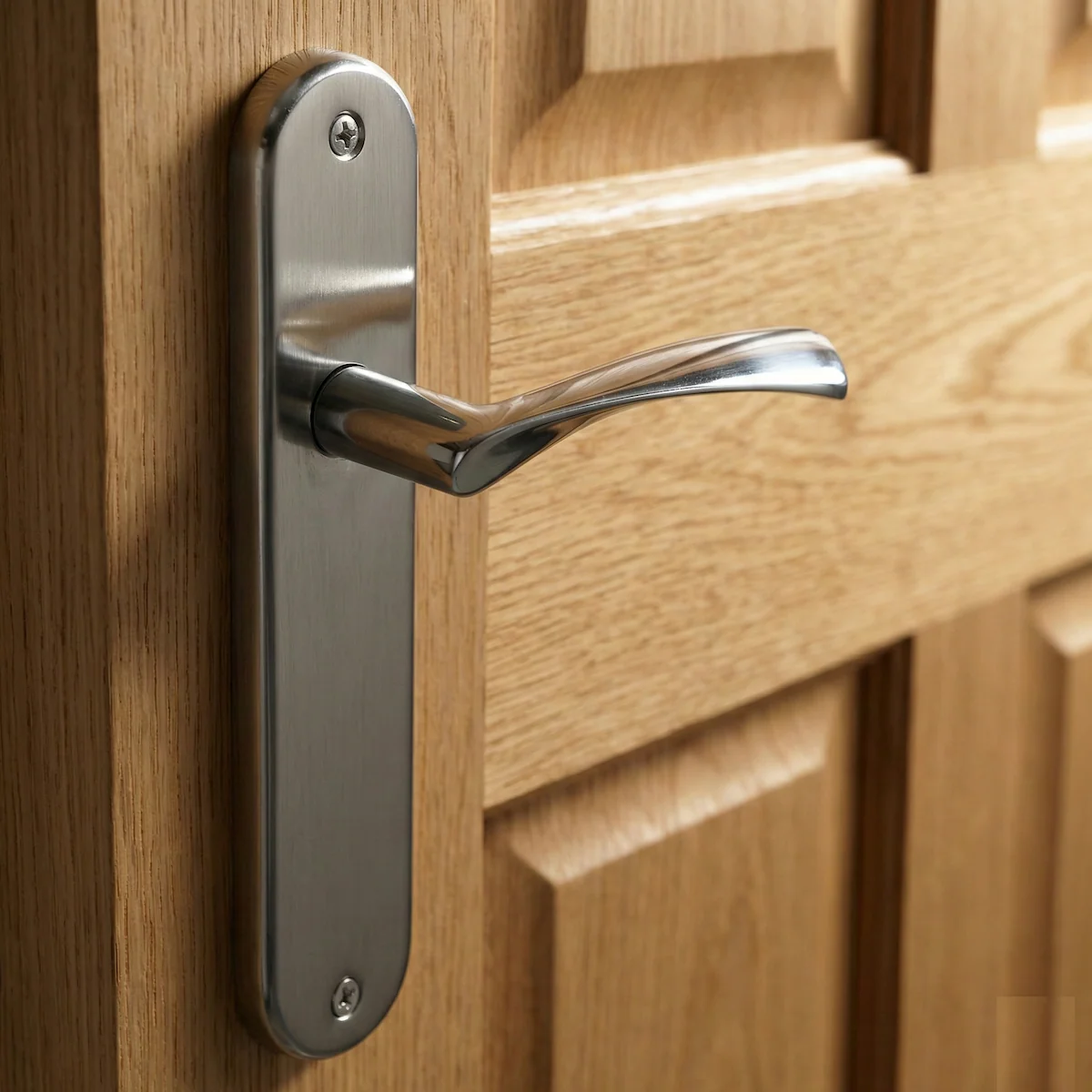 Manilla modelo '130' ola con placa ovalada de zamak para puertas en acabado níquel satinado - Image 2